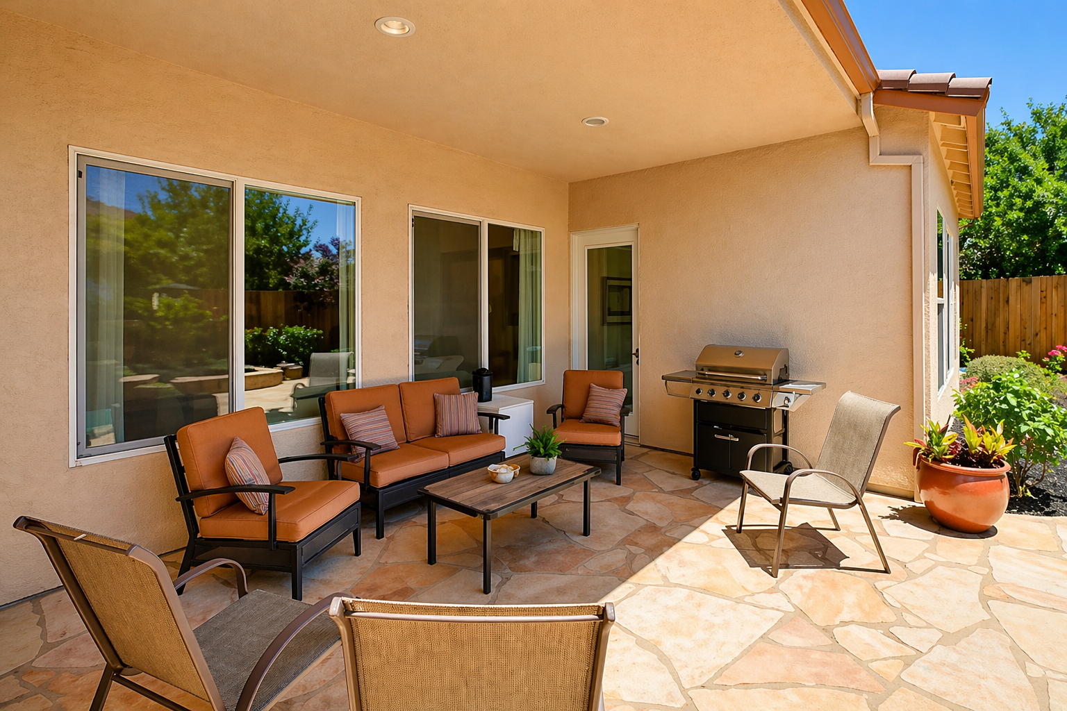 Covered back patio with outdoor seating
